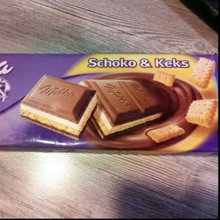 Milka Milk Chocolate Cream and Cookie 300g — photo 4