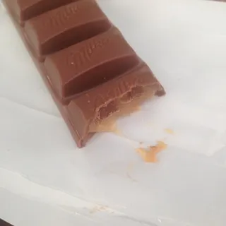Milka Chocolate with Caramel Filling 39g — photo 6
