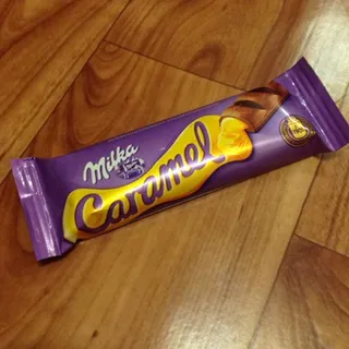 Milka Chocolate with Caramel Filling 39g — photo 8