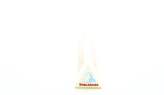 Toblerone White Chocolate with Honey Almond Nougat Box 100g — photo 6
