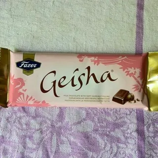 Geisha milk chocolate with ground hazelnut filling 100 g — photo 2