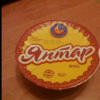 Molochnyi Shliakh Pyriatyn Yantar processed cheese spread 60% 100g plastic cup — photo 3