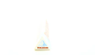 Toblerone White Chocolate with Honey Almond Nougat Box 100g — photo 4