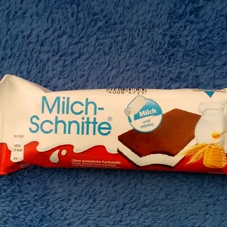 Тістечко Kynder Milk Slice бісквітне з молочною начинкою 28г — фото 8
