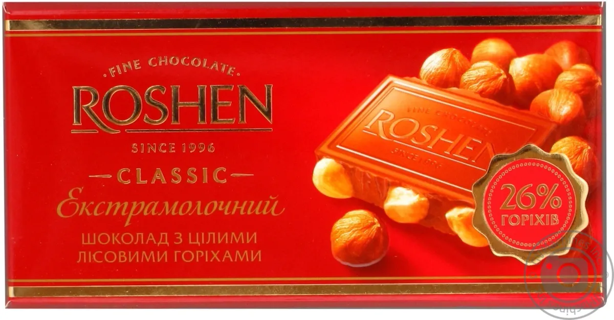 Шок Рошен 100 г екстрамолочний з цільними ліс. горіхами 26%