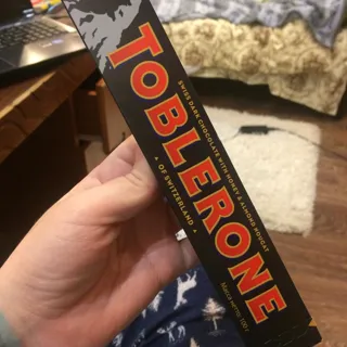 Toblerone Dark Chocolate with Honey Almond Nougat 100g — photo 3