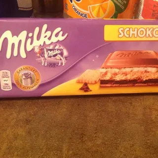 Milka Milk Chocolate Cream and Cookie 300g — photo 5