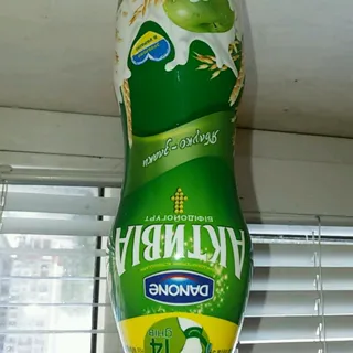 Bifidoyogurt Danone Activia Apple Grains 1.5% plastic bottle 580g — photo 3