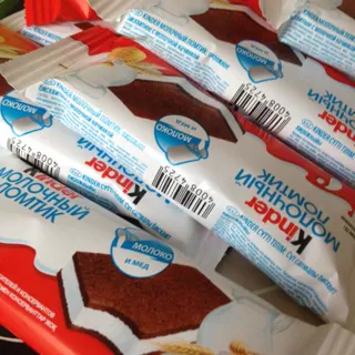Тістечко Kynder Milk Slice бісквітне з молочною начинкою 28г — фото 10