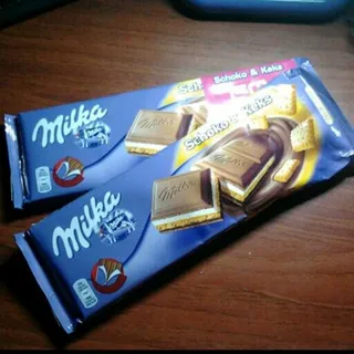 Milka Milk Chocolate Cream and Cookie 300g — photo 3