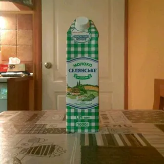 Selianskoe Special Milk UHT 1.5% 1000g Tetra Pak — photo 4